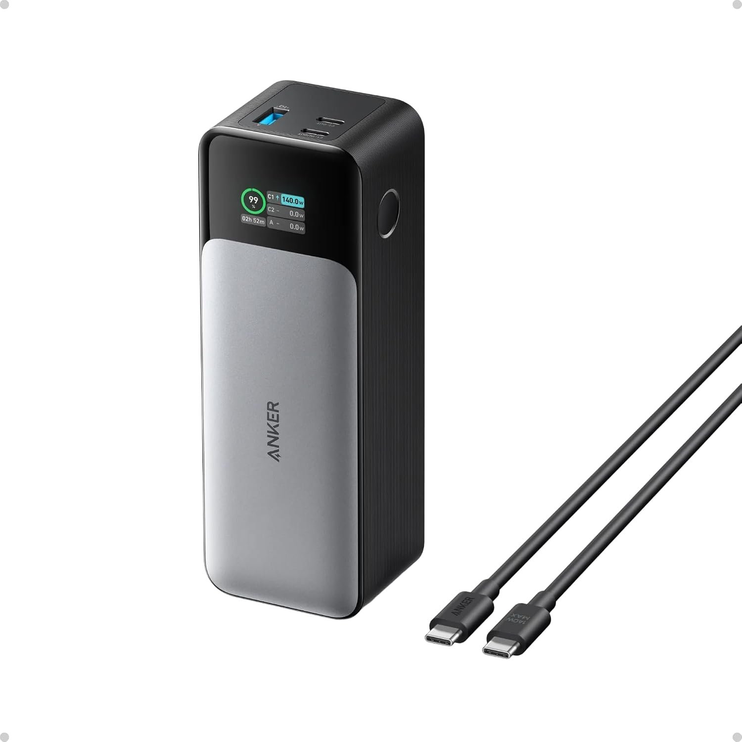 Chunky Anker 737 power bank with a small digital display showing wattage and battery percentage, two USB-C ports and a USB-A port.