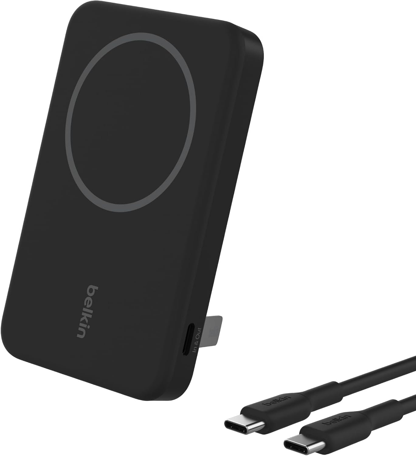 White Belkin 5,000mAh magnetic power bank stuck to the back of an iPhone with a pop-out kickstand holding the phone upright.