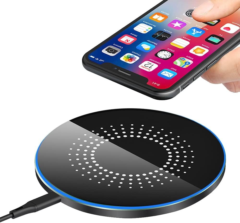A compact wireless charging pad with a blue LED ring glowing around its edge.