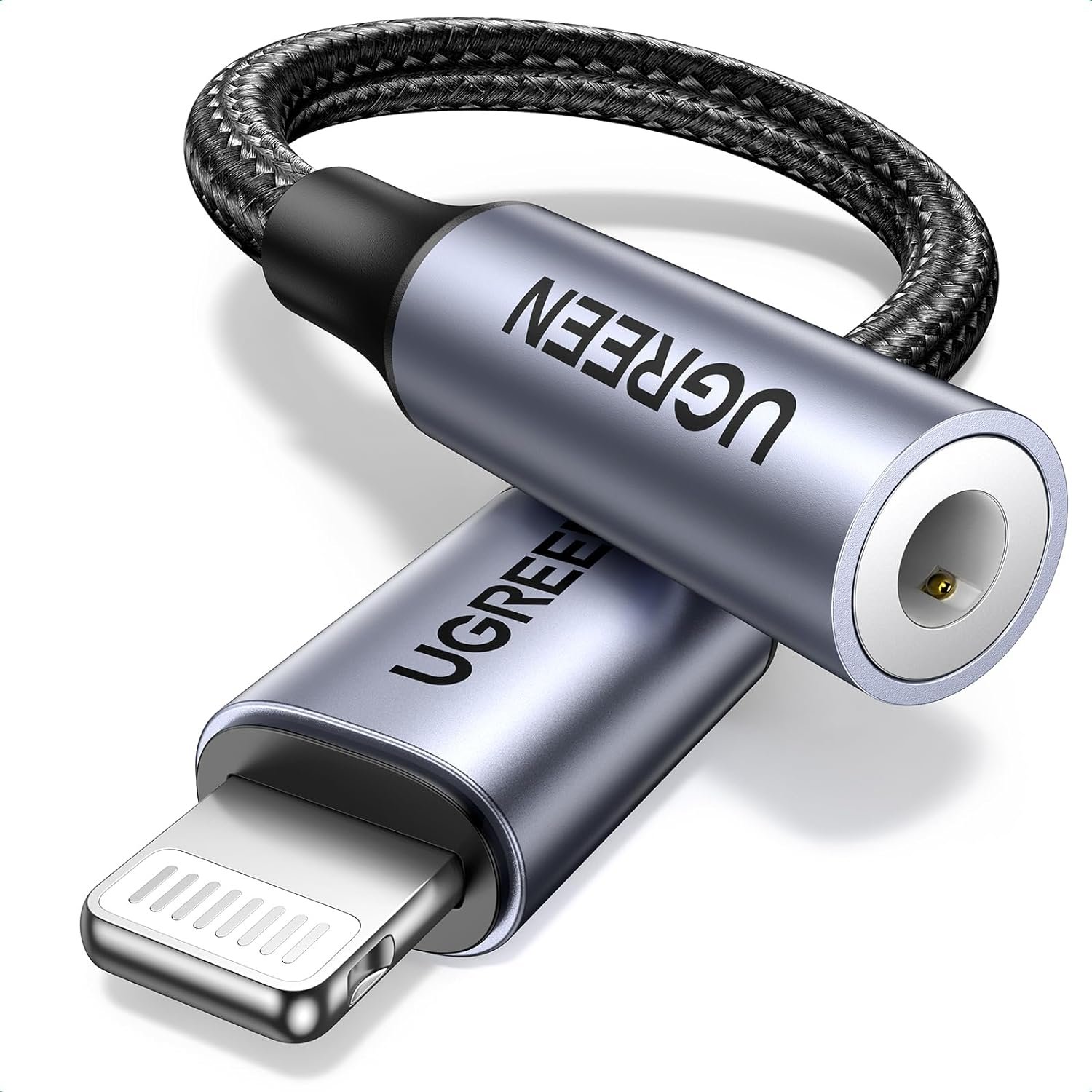 Short grey UGREEN adapter with a Lightning plug on one end and a 3.5mm headphone jack on the other.